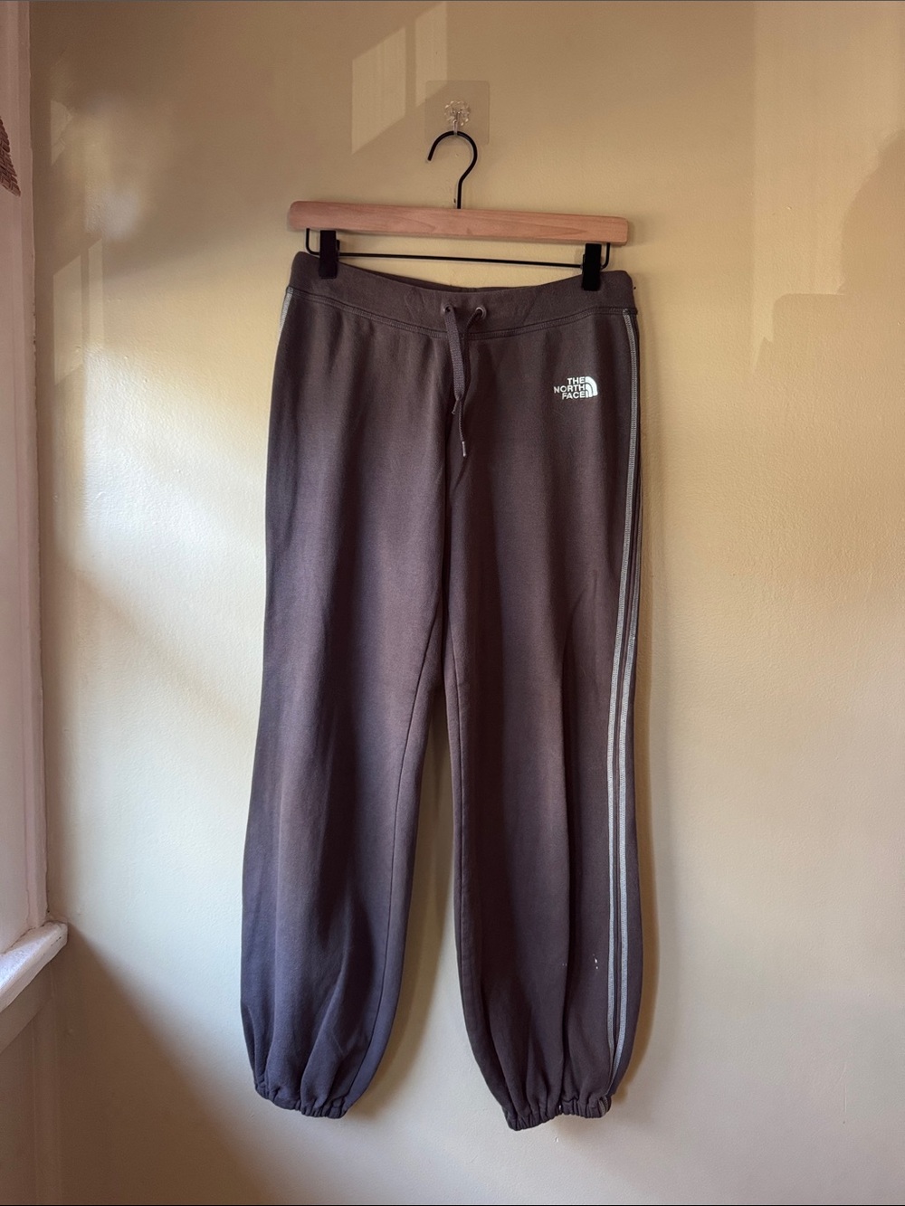 The North Face Charcoal Sweatpants with Blue Side Stripes